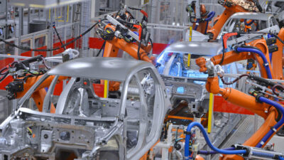 Through TSN capabilities, robots are working on a project.