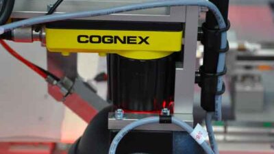 In the Mondragon Assembly photovoltaic soldering machine, two induction soldering heads are equipped with the In-Sight 5100 intelligent vision system (one shown) to move over work areas. Courtesy: Cognex