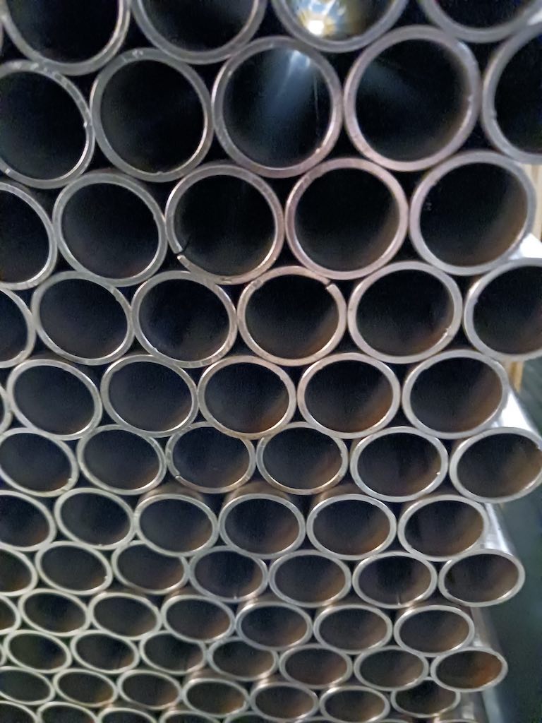 A stack of metal tubes at Freedman Seating Co. awaits bending into seat shape. Courtesy: Mark T. Hoske, Control Engineering