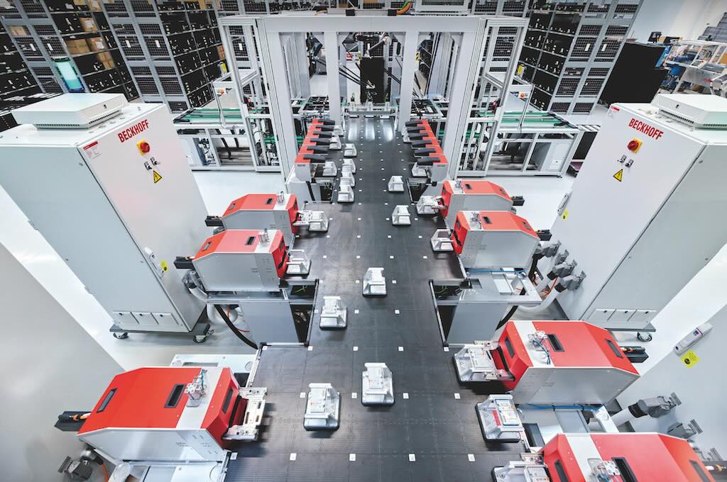 Figure 1: The XPlanar-based floating tile motion control system from Beckhoff Automation is optimized for maximum throughput with seamless control and monitoring. This ensures efficient programming, adjustment, calibration and function testing in Beckhoff’s I/O production. Beckhoff AMI8100 integrated servo drives infeed and eject trays because of compact size, 48 V operation and EtherCAT communications. 