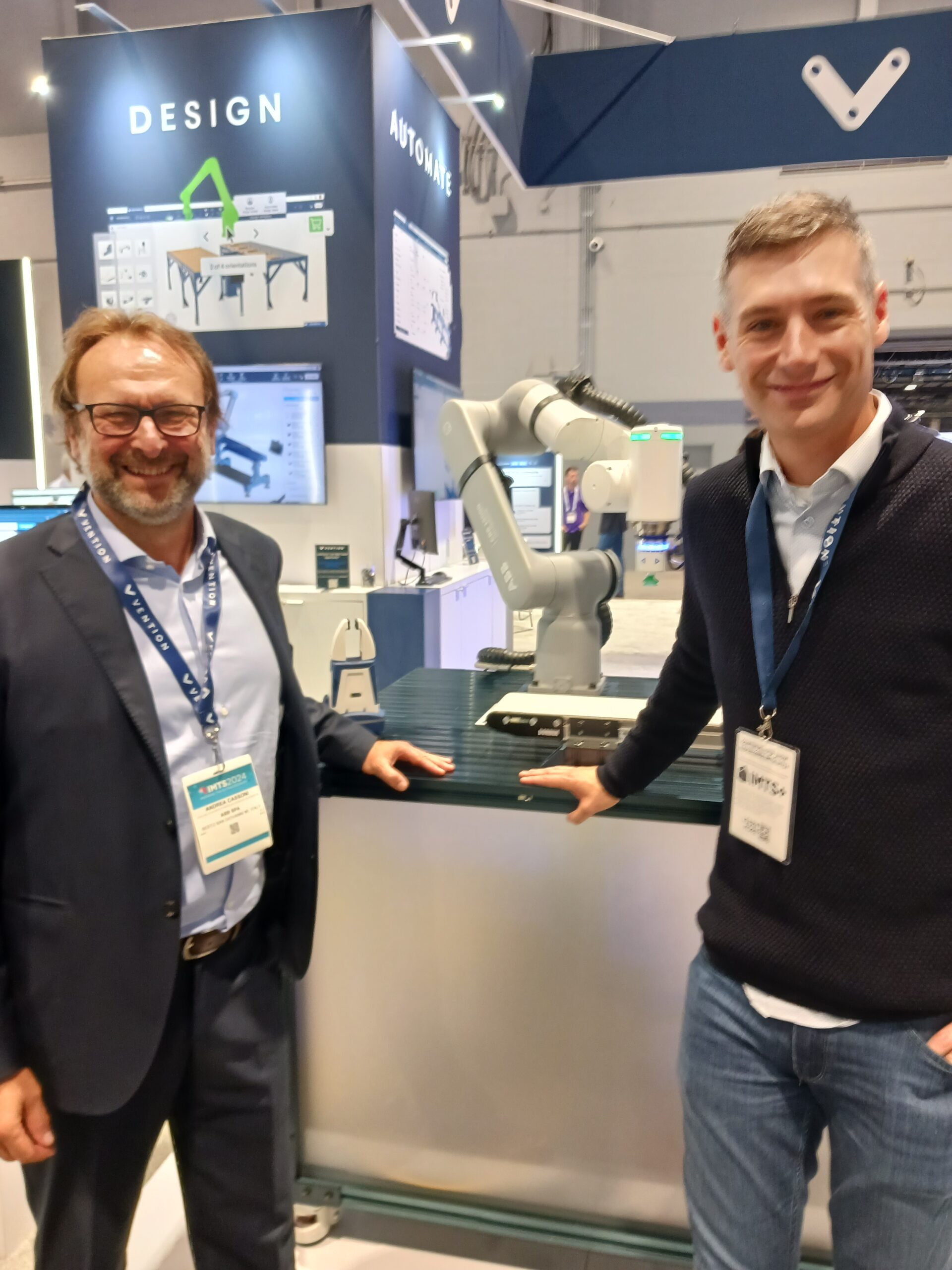 Figure 1: At left, Andrea Cassoni, the global head of collaborative robotics and partnerships development with ABB, celebrates at IMTS 2024 with Etienne Lacroix, founder and CEO of Vention, an expanded collaboration between ABB and Vention providing ABB GoFa collaborative robot online services. Courtesy: Mark T. Hoske, Control Engineering