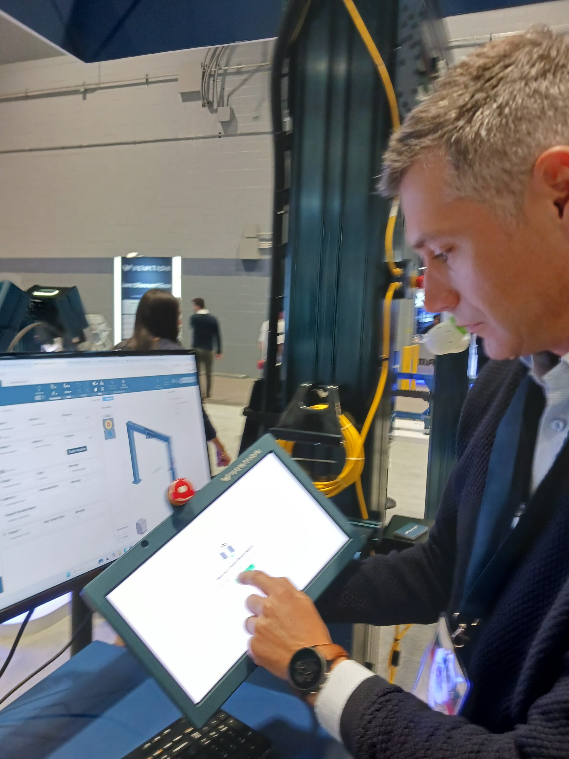 Figure 2: Online support services from Vention helps with collaborative robot setup, programming and operations of an ABB GoFa cobot, as shown Etienne Lacroix, founder and CEO of Vention at IMTS 2024, using the Vention Manufacturing Automation Platform (MAP). Courtesy: Mark T. Hoske, Control Engineering