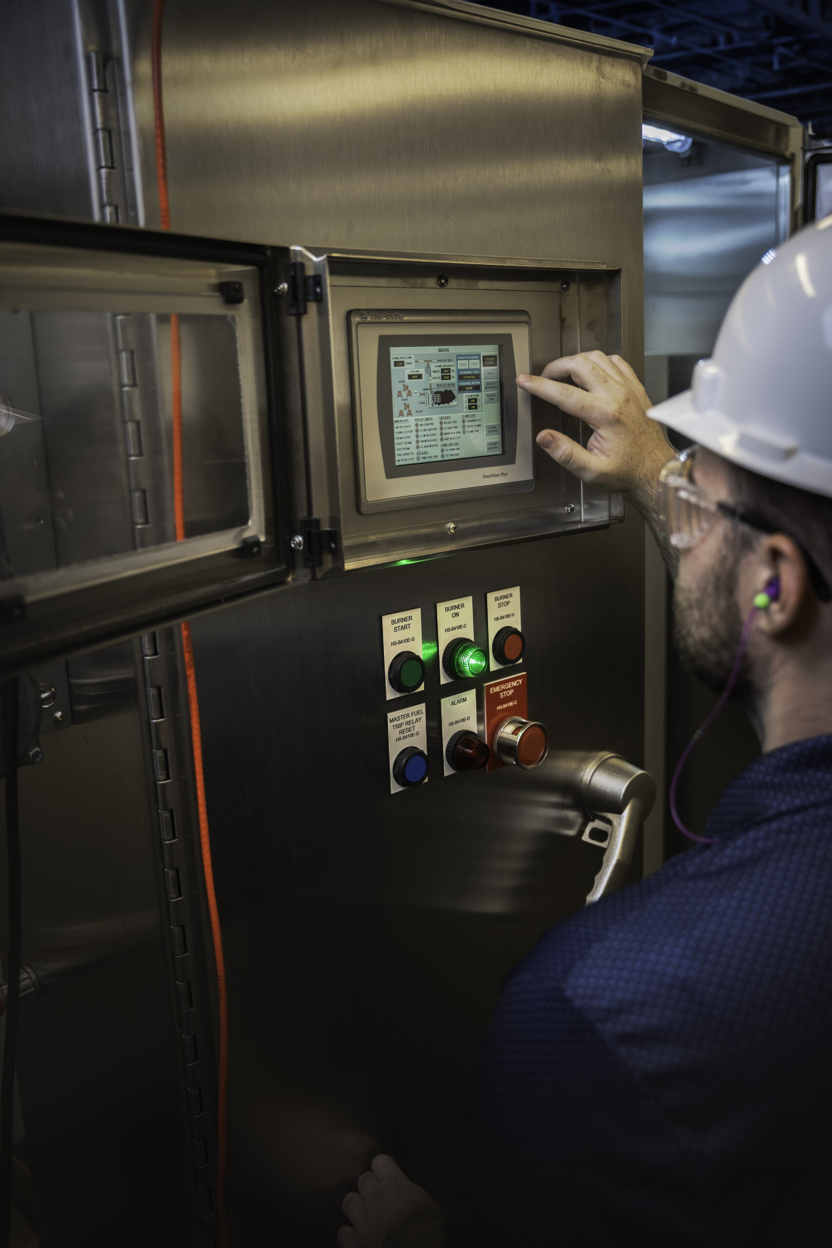 Figure 1: An automation specialist verifying PanelView during site acceptance testing. Courtesy: Hargrove Controls & Automation